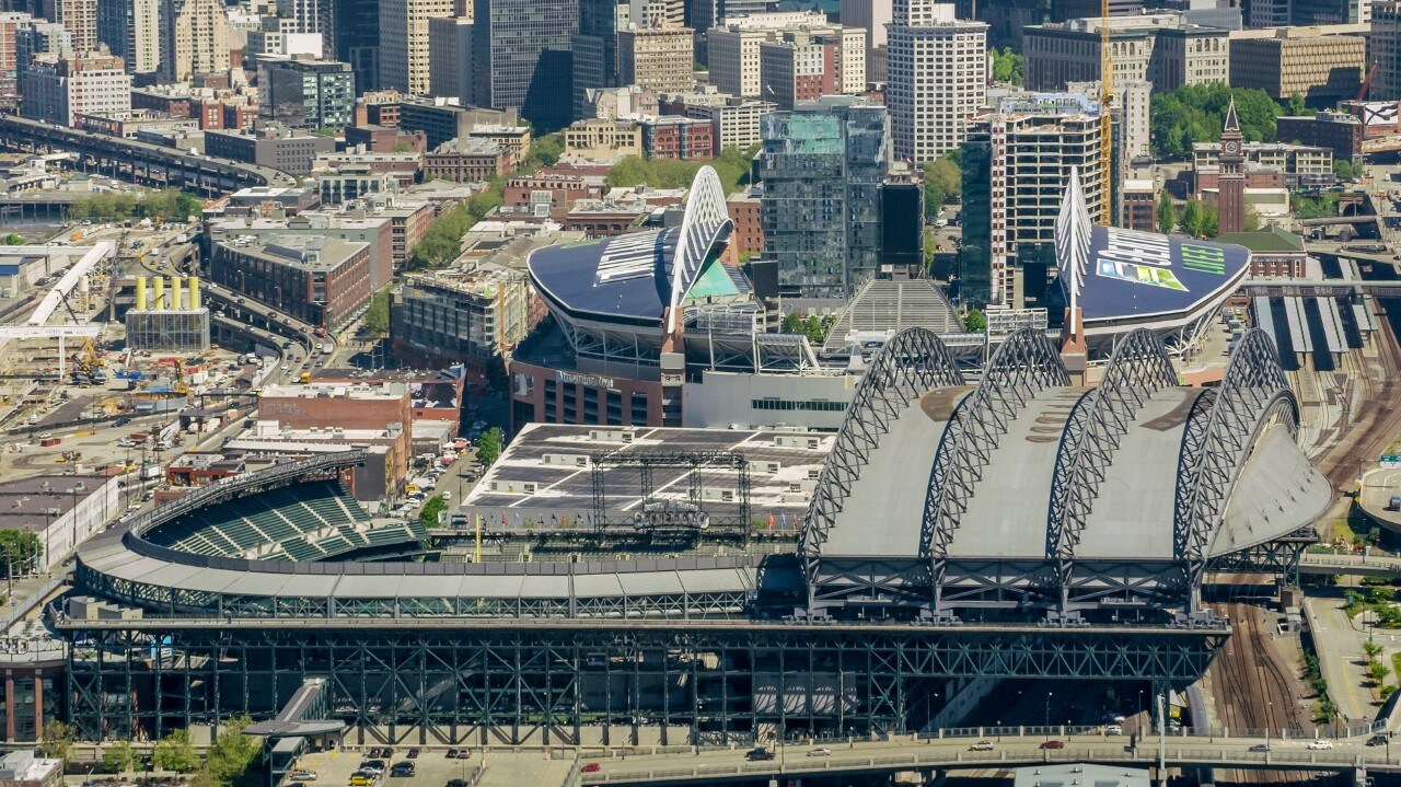 View of crowded modern cityscape with CenturyLink Field stadium, Seattle, Washington, United States.